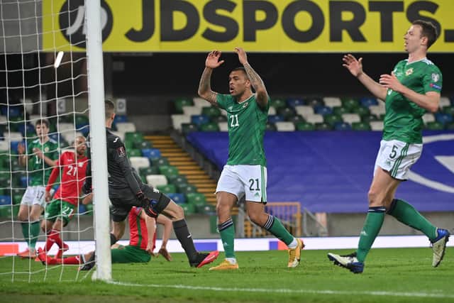Northern Ireland’s Josh Magennis and Jonny Evans react in frustration last night during the World Cup qualifiers’ scoreless draw with Bulgaria. Pic by Pacemaker.