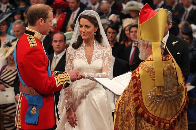 Prince William and Kate Middleton exchange rings in front of the Archbishop of Canterbury during their wedding at Westminster Abbey, on April 29, 2011 in London