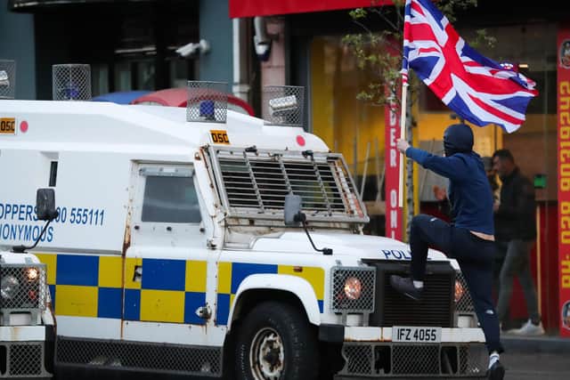 Loyalists involved in disturbances with the PSNI in the Donegall Road, Sandy Row area of south Belfast after the police moved in to disperse a crowd taking part in a protest at Shaftsbury Square.  

Photo by Kelvin Boyes / Press Eye.