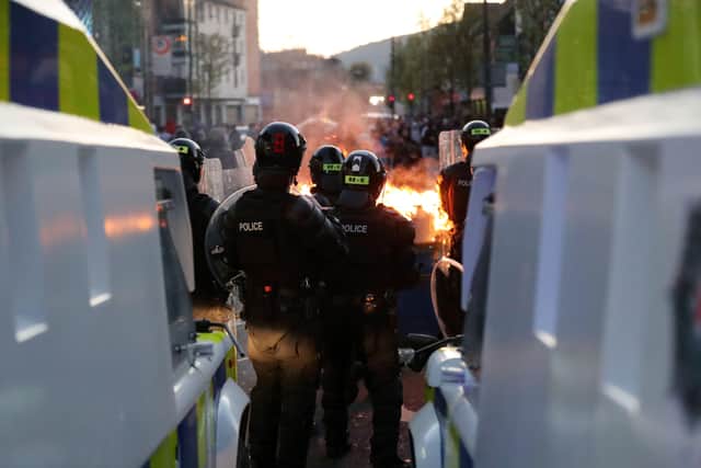 Loyalists take part in a protest at Shaftsbury Square near Sandy Row in south Belfast as the PSNI moved in to disperse the crowd.
 Photo by Kelvin Boyes / Press Eye.
