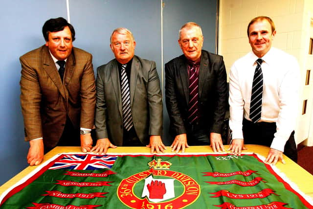 David Campbell, left, the former UUP MLA who is chair of the Loyalist Communities Council (LCC), unveiling a new flag for the centenary of the Battle of the Somme in 2016. Also pictured is, Jim Wilson, second from left, then Jackie McDonald and Winston Irvine. 
Picture by Pacemaker Press