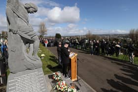People take part in a dissident Easter Monday wreath laying ceremony in Derry City cemetery, Creggan, Northern Ireland. Photo: Liam McBurney/PA Wire