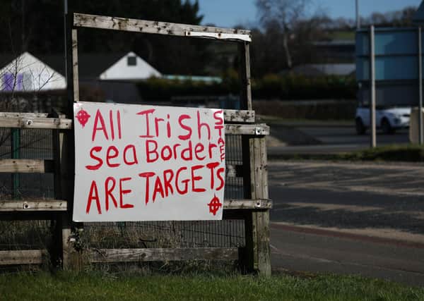 Graffiti in Larne Co Antrim referring to the Irish sea border and the NI Protocol