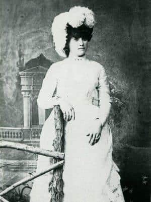 A formal studio photograph of  Nellie Cashman in Tombstone