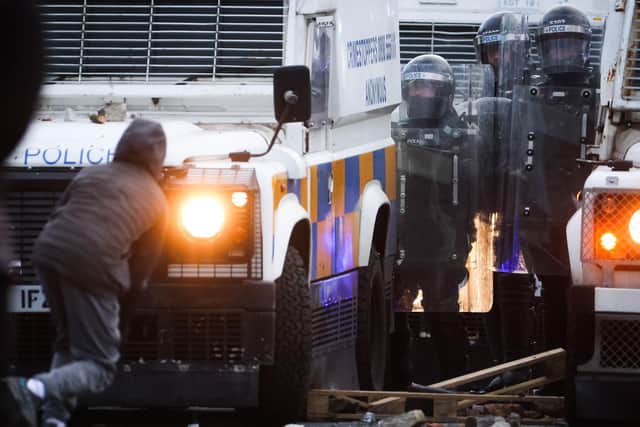 Nationalist youths clashing with the PSNI on the Springfield Road close to the peace line in west Belfast this evening. 

Photo by Kelvin Boyes / Press Eye.