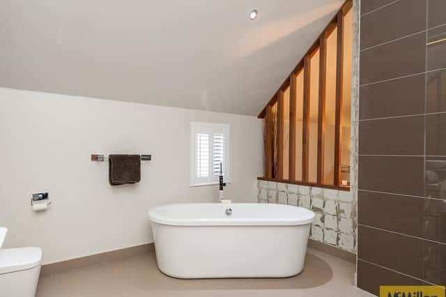 The property's four bedrooms all have en-suite facilities
