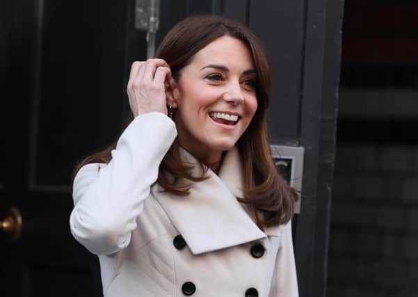 The Duchess of Cambridge smiles following a visit to mental health charity Jigsaw, at Temple Bar in Dublin, as part of her three day visit to the Republic of Ireland