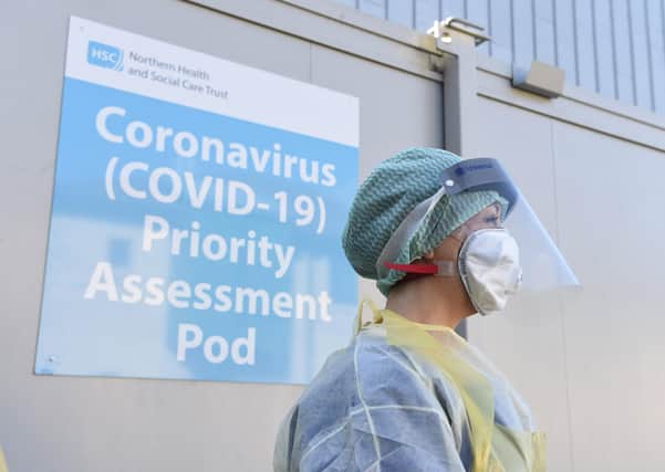 An Emergency Department Nurse during a demonstration of the Coronavirus pod and COVID-19 virus testing procedures set-up beside the Emergency Department of Antrim Area Hospital, Co Antrim in Northern Ireland