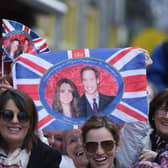 People in Galway await the arrival of the Duke and Duchess of Cambridge for a visit to the town on March 5, during the third day of their visit to the Republic of Ireland