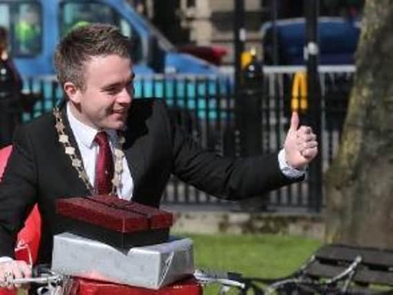 Former Deputy Lord Mayor of Belfast is Alderman Guy Spence gets on his bike