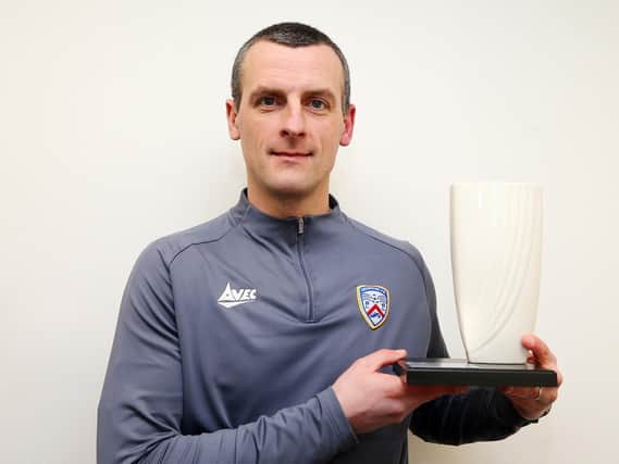 Coleraine manager Oran Kearney with the Belleek trophy