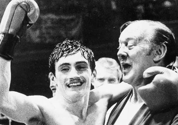 Barry McGuigan with Barney Eastwood in 1983 after defeating Valerio Nati to become the new European featherweight champion in the King's Hall, Belfast.