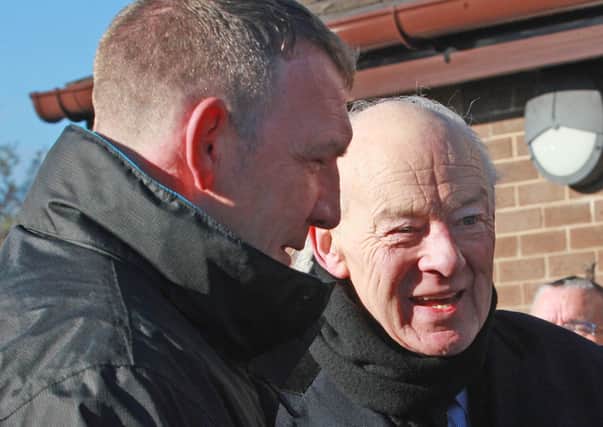 Barney Eastwood and Boxer Martin Rogan the during funeral of boxing coach Paul McCullagh at St Luke's Church in west Belfast in 2018.