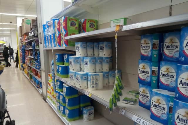 Shelves in Tesco, Belfast city centre, were running low on toilet rolls on Wednesday afternoon, and customers were being advised not to buy more than five of any one item