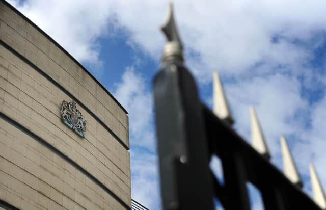 The trial is taking place at Belfast Crown Court