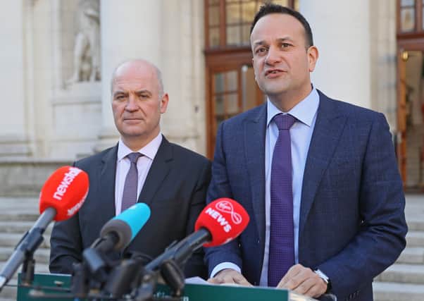 Irish Taoiseach Leo Varadkar (right), alongside Chief Medical Officer Dr Tony Holohan, at Government Buildings in Dublin.