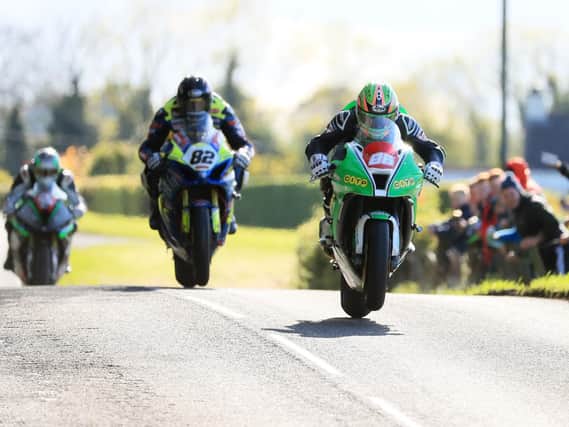Derek McGee, Derek Sheils and Michael Sweeney in action at the Tandragee 100. road races in 2019.