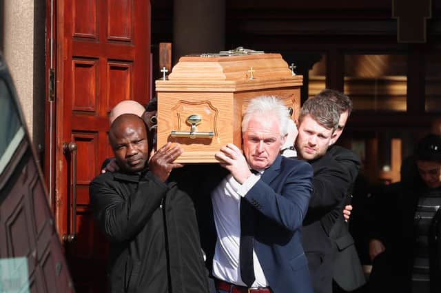 The coffin is carried from St Colmcille's Church, Holywood, Co Down at the funeral of boxing promoter and bookmaker Barney Eastwood. PA Photo. Picture date: Friday March 13, 2020. See PA story FUNERAL Eastwood. Photo credit should read: Liam McBurney/PA Wire