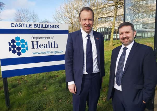 NI health minister Robin Swann (right) with UK health secretary Matt Hancock