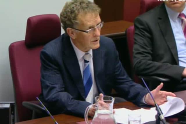 Sir Patrick Coghlin addressing the opening of the inquiry into the botched green energy scheme which triggered the collapse of political powersharing in Northern Ireland