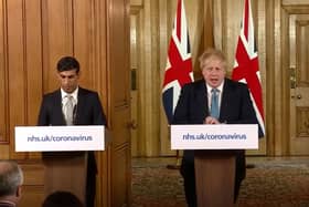 Chancellor Rishi Sunak and Prime Minister Boris Johnson during a media briefing in Downing Street