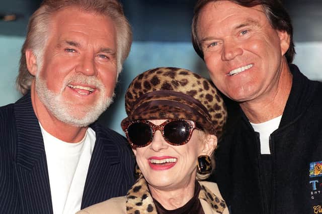 Country and Western singers (left to right) Kenny Rogers, Tammy Wynette and Glen Campbell when they were  in central London for a news conference to launch their "Unforgettable" tour around Britain. Rogers, whose husky voice carried him as a TV and music star across genres, has died aged 81