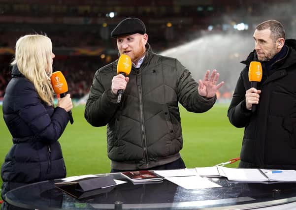 John Hartson (centre) working as a pundit in the Europa League. Pic by PA.
