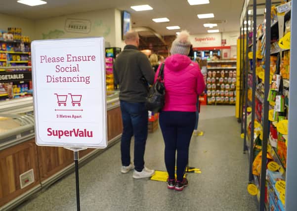 Social distancing in action in a Northern Irish supermarket