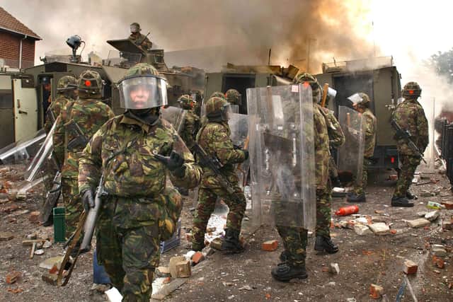 Soldiers in Northern Ireland in September 2005 amid loyalist disorder after a parade was re-routed