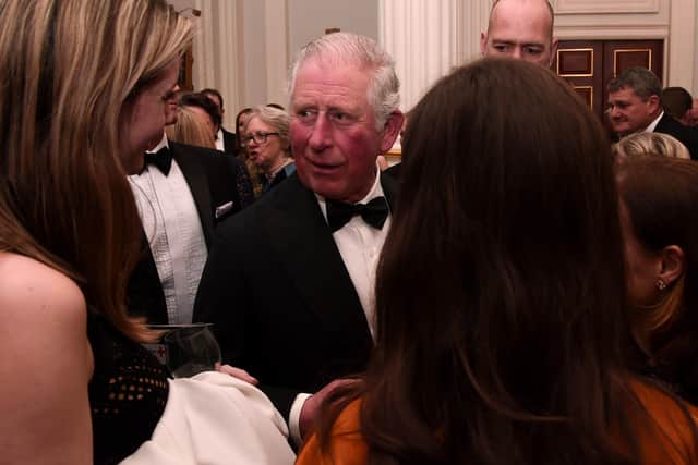 File photo dated 12/03/20 of the Prince of Wales meeting guests at a dinner at Mansion House in London