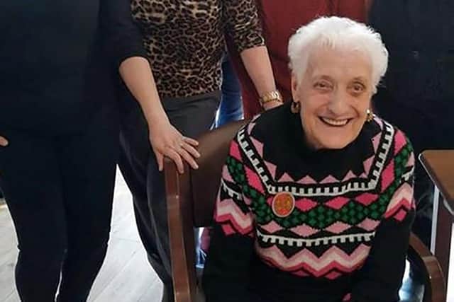 The 6th COVID 19 victim in Northern Ireland Magdalene Mitchell. She is pictured with her family
A resident of a Belfast care home has died after testing positive for coronavirus, her family have confirmed.
She was 80-year-old Magdalene Mitchell.
Radio Ulster's Nolan show reported that two residents in Bradley Manor, on Belfastâ€TMs Crumlin Road, were admitted to hospital after taking sick