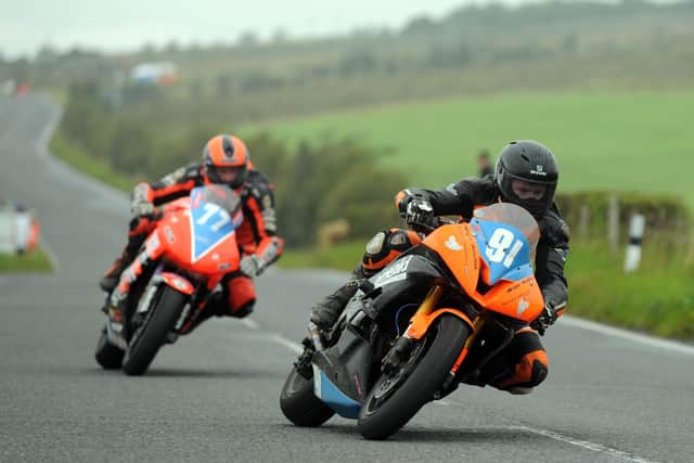 Wayne Hamilton leads Ryan Farquhar in the Supertwin race at the Dundrod 150 meeting at the 2011 Ulster Grand Prix. Picture: Pacemaker Press.