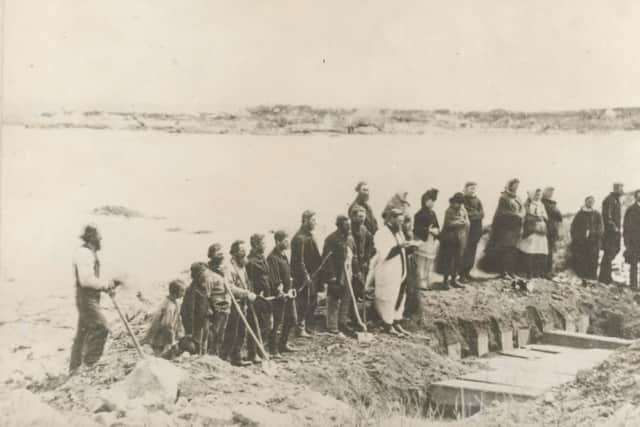 Rev W. Ancient (centre) at Burial Service of Victims of SS Atlantic at Lower Prospect, Nova Scotia. April 1873