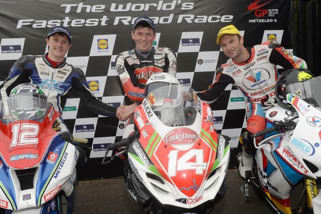 Ulster Grand Prix Superstock race winner Dan Kneen with runner-up Dean Harrison (left) and Bruce Anstey in 2014.