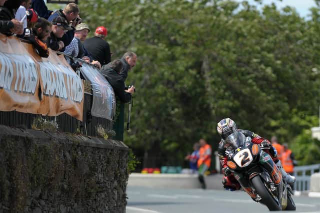 John McGuinness was ruled out of the Senior TT whilst leading after the chain broke on his HM Plant Honda.