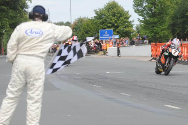 Steve Plater crosses the line to win the 2009 Senior TT in only his third year of racing around the Mountain Course.