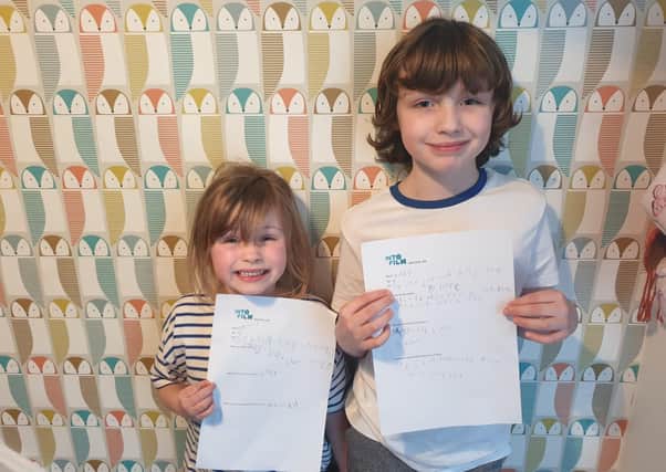 Nancy (6) and Rudy (8) from Belfast with their reviews of The Lion, The Witch and the Wardrobe ready to post online as part of Into Film’s new Review 100 competition