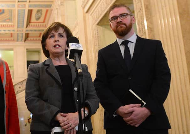 Diane Dodds, now the economy minister, pictured in 2017 next to Simon Hamilton, who is today head of the Belfast Chamber of Commerce