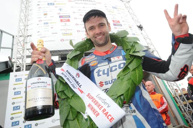 William Dunlop celebrates his first international Superbike victory at the North West 200 in 2014.