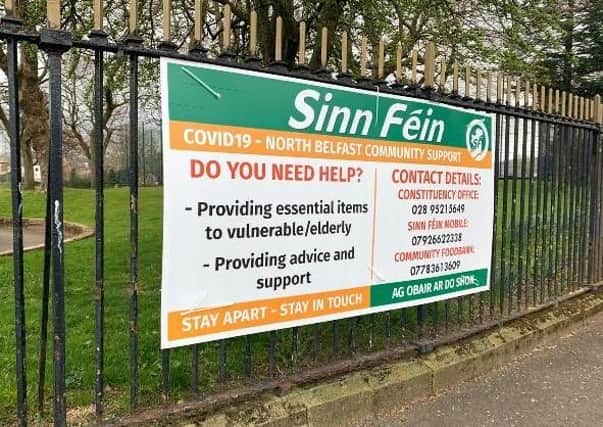 A Sinn Fein banner erected on a park railing