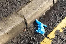 A latex glove discarded at the roadside in Larne.