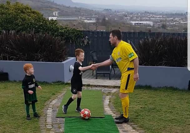 Kieran played the game against his children wearing the Cliftonville kit he wore in the 2009 final against Crusaders