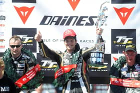 Cameron Donald celebrates his maiden Isle of Man TT win in the Superbike race in 2008 with runner-up Bruce Anstey (left) and Adrian Archibald.