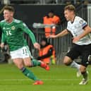 Northern Ireland's Jordan Thomspon up against Germany in the EURO 2020 qualifying campaign. Pic by Pacemaker.
