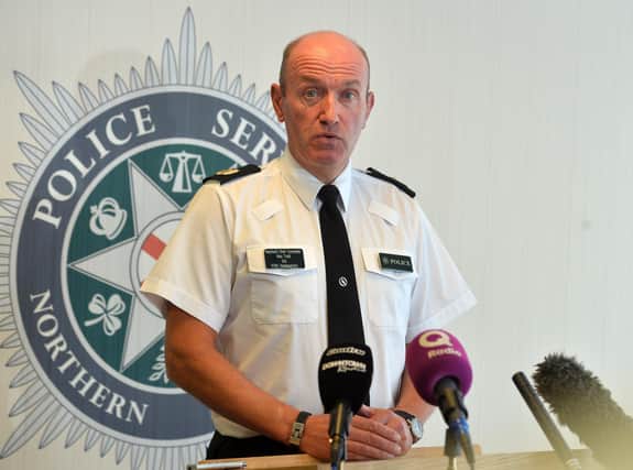 PaPACEMAKER BELFAST  12/08/2019
PSNI ACC Alan Todd speaks to the  media at PSNI  Headquarters on Monday.
Members of Clydevalley Flute Band from Larne wore the symbol with the letter 'F' on their shirts during Saturday's parade in Derry.
Photo Colm Lenaghan/Pacemaker Press