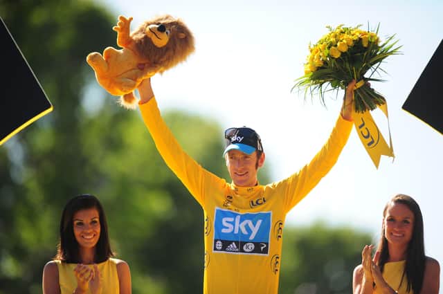 Sir Bradley Wiggins celebrates Tour de France glory in 2012. Photo credit: PA Wire.