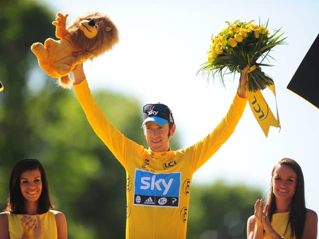 Sir Bradley Wiggins celebrates Tour de France glory in 2012. Photo credit: PA Wire.