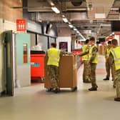 Soldiers involved in moving medical supplies at the Principality Stadium, Cardiff, which is being turned into a 2,000-bed hospital