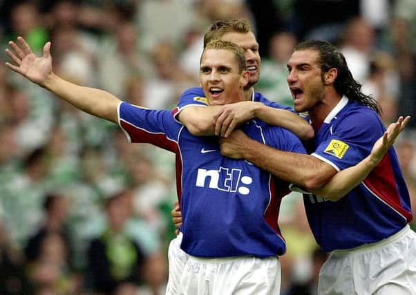 Rangers' Peter Lovenkrands celebrates in 2002. Pic by PA.