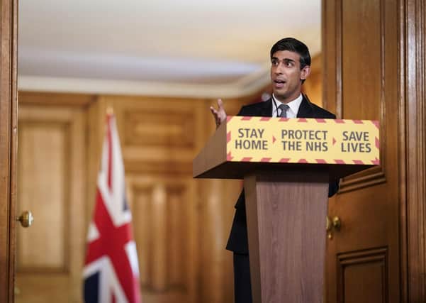 Chancellor Rishi Sunak addresses the nation during a daily coronavirus briefing in London on Tuesday